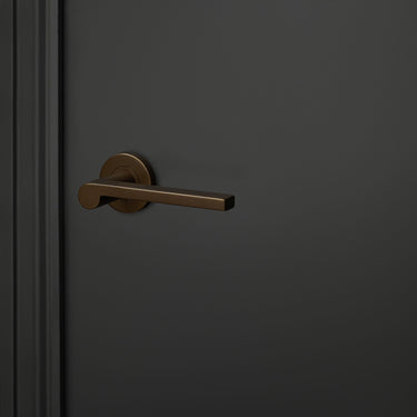 Caserta deurklink brons met rond rozet