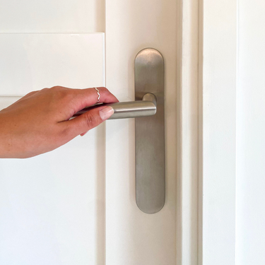 Mantua deurklink rvs schild kopen